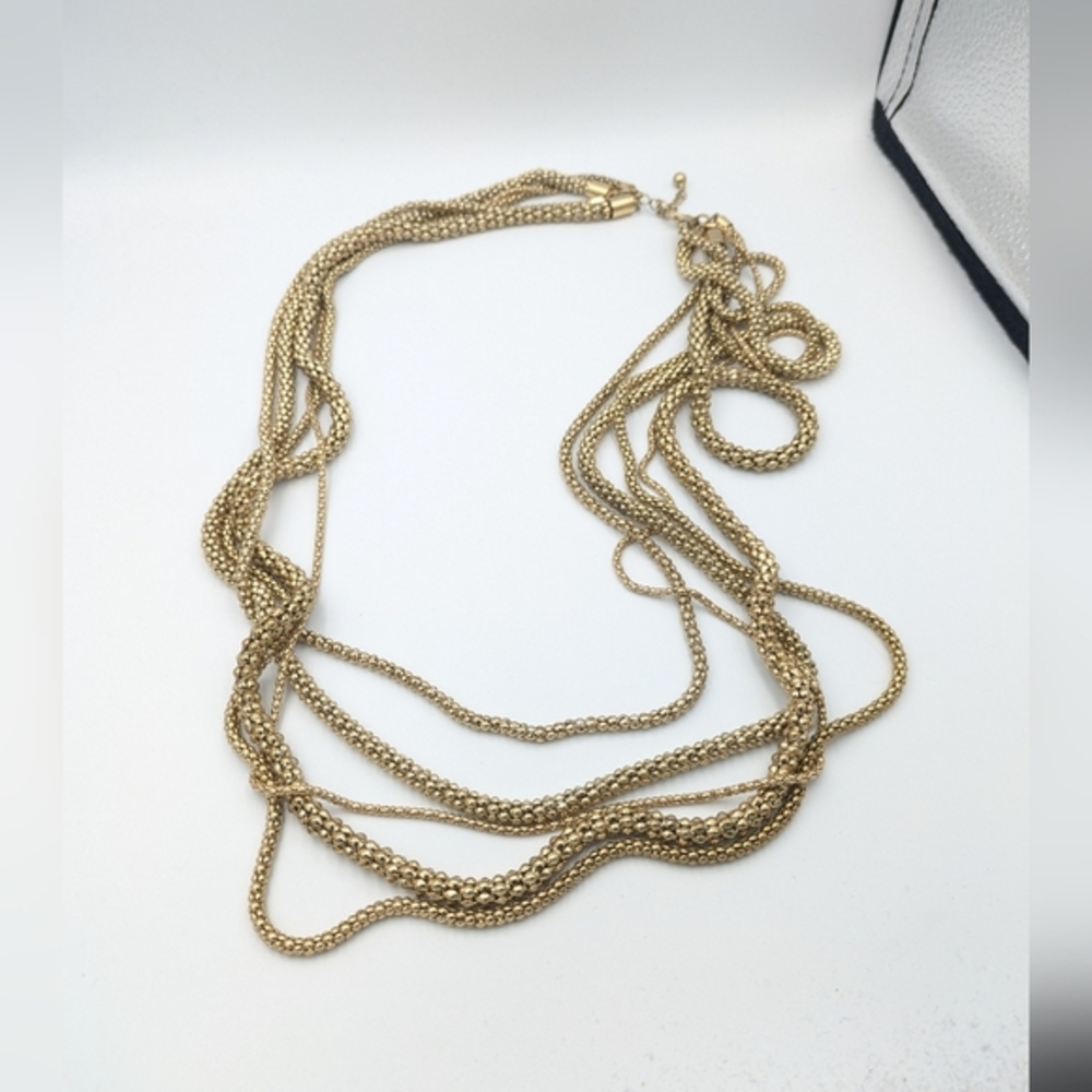 Vintage very long multi strand gold tone necklace